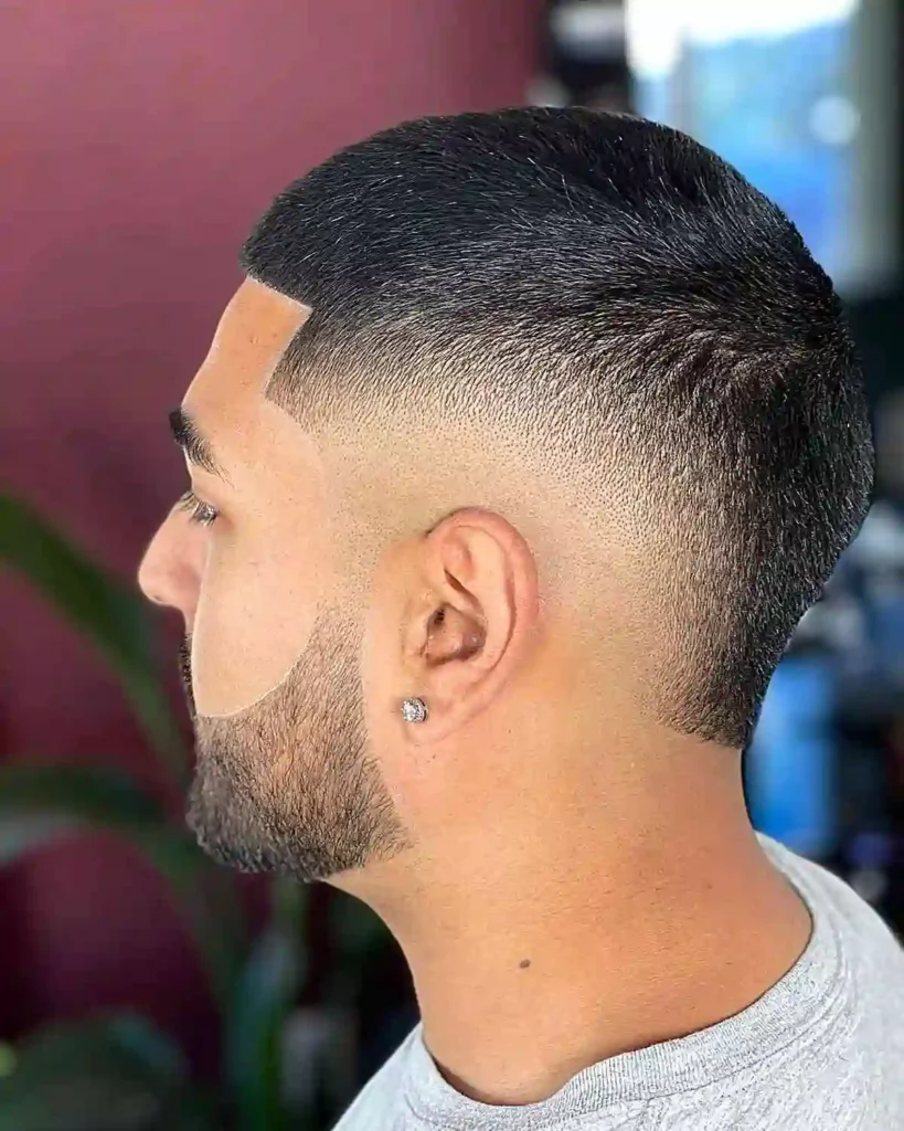 burst skin fade with line up buzz cut on guys